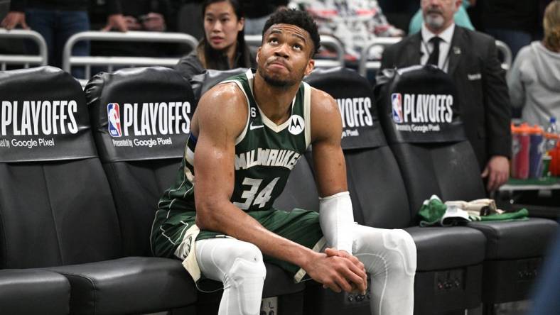 Apr 26, 2023; Milwaukee, Wisconsin, USA; Milwaukee Bucks forward Giannis Antetokounmpo (34) sits on the bench after a 128-126 loss to the Miami Heat during game five of the 2023 NBA Playoffs at Fiserv Forum. Mandatory Credit: Michael McLoone-USA TODAY Sports