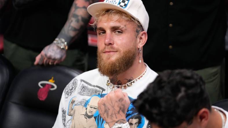 May 6, 2023; Miami, Florida, USA; Jake Paul watches a game between the Miami Heat and the New York Knicks during game three of the 2023 NBA playoffs at Kaseya Center. Mandatory Credit: Rich Storry-USA TODAY Sports