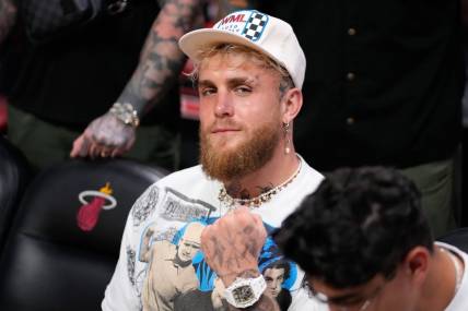 May 6, 2023; Miami, Florida, USA; Jake Paul watches a game between the Miami Heat and the New York Knicks during game three of the 2023 NBA playoffs at Kaseya Center. Mandatory Credit: Rich Storry-USA TODAY Sports