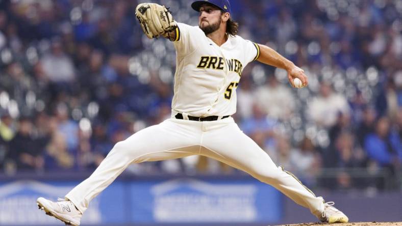 May 8, 2023; Milwaukee, Wisconsin, USA;  Milwaukee Brewers pitcher Bennett Sousa (57) throws a pitch during the eighth inning against the Los Angeles Dodgers at American Family Field. Mandatory Credit: Jeff Hanisch-USA TODAY Sports