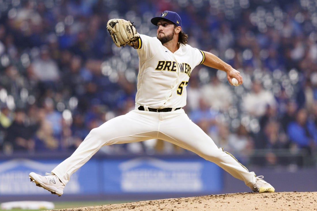 May 8, 2023; Milwaukee, Wisconsin, USA;  Milwaukee Brewers pitcher Bennett Sousa (57) throws a pitch during the eighth inning against the Los Angeles Dodgers at American Family Field. Mandatory Credit: Jeff Hanisch-USA TODAY Sports