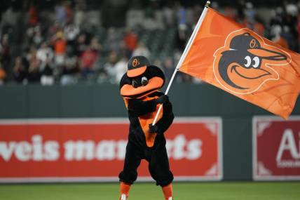 May 10, 2023; Baltimore, Maryland, USA; the Baltimore Orioles mascot waves a flag after a 2-1 victory over the Tampa Bay Rays at Oriole Park at Camden Yards. Mandatory Credit: Brent Skeen-USA TODAY Sports