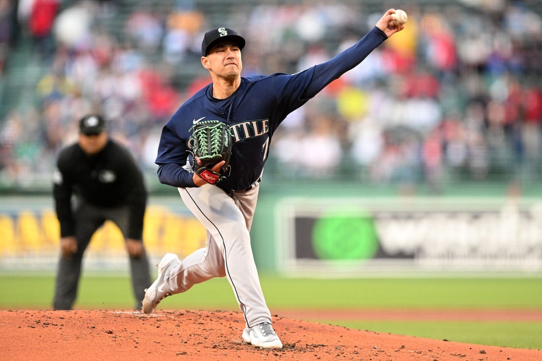 May 17, 2023; Boston, Massachusetts, USA; Seattle Mariners starting pitcher Marco Gonzales (7) pitches against the Boston Red Sox during the first inning at Fenway Park. Mandatory Credit: Brian Fluharty-USA TODAY Sports