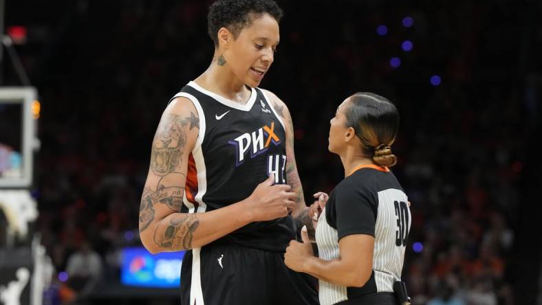 May 21, 2023; Phoenix, Arizona, USA; Phoenix Mercury center Brittney Griner (42) talks to WNBA official Sha'Rae Mitchell in the second half against the Chicago Sky at Footprint Center. Mandatory Credit: Rick Scuteri-USA TODAY Sports