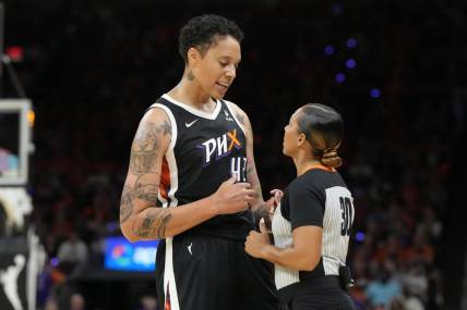 May 21, 2023; Phoenix, Arizona, USA; Phoenix Mercury center Brittney Griner (42) talks to WNBA official Sha'Rae Mitchell in the second half against the Chicago Sky at Footprint Center. Mandatory Credit: Rick Scuteri-USA TODAY Sports