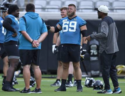 Jacksonville Jaguars center Tyler Shatley (69) talks with players and coaches during Monday morning's offseason camp session. Rookies and veterans gathered at TIAA Bank Field Monday, May 22, 2023 for the start of the Jacksonville Jaguars offseason camp. [Bob Self/Florida Times-Union]