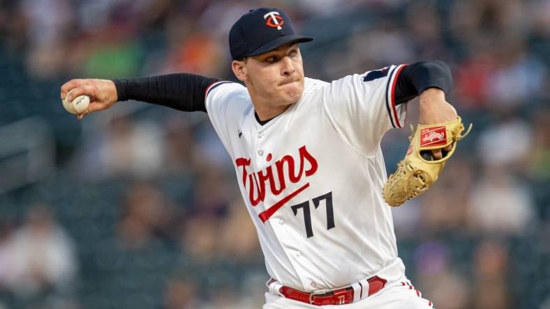 May 22, 2023; Minneapolis, Minnesota, USA; Minnesota Twins starting pitcher Cole Sands (77) delivers a pitch in the eighth inning against the San Francisco Giants at Target Field. Mandatory Credit: Jesse Johnson-USA TODAY Sports