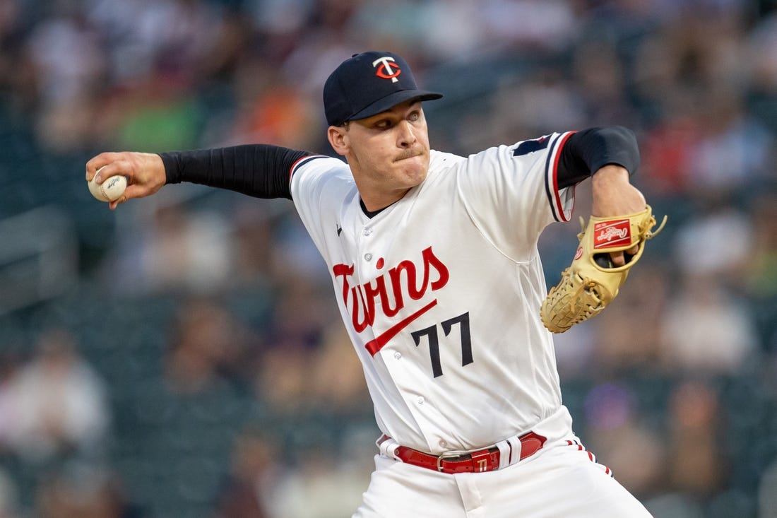 May 22, 2023; Minneapolis, Minnesota, USA; Minnesota Twins starting pitcher Cole Sands (77) delivers a pitch in the eighth inning against the San Francisco Giants at Target Field. Mandatory Credit: Jesse Johnson-USA TODAY Sports