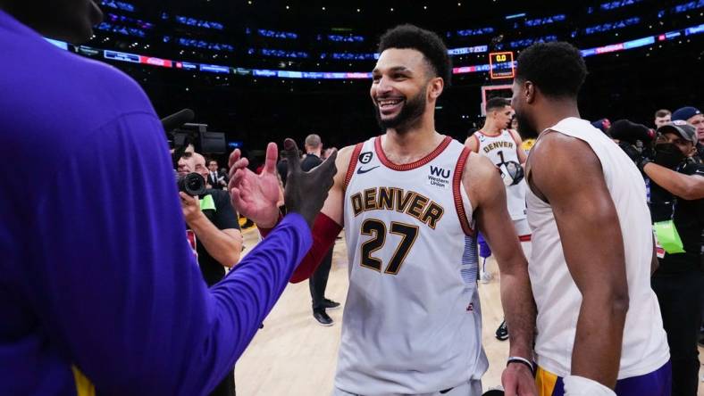 May 22, 2023; Los Angeles, California, USA; Denver Nuggets guard Jamal Murray (27) reacts to beating the Los Angeles Lakers in game four of the Western Conference Finals for the 2023 NBA playoffs at Crypto.com Arena. Mandatory Credit: Kirby Lee-USA TODAY Sports