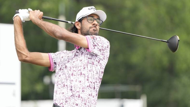 May 27, 2023; Fort Worth, Texas, USA; Akshay Bhatia plays his shot from the third tee during the third round of the Charles Schwab Challenge golf tournament. Mandatory Credit: Jim Cowsert-USA TODAY Sports