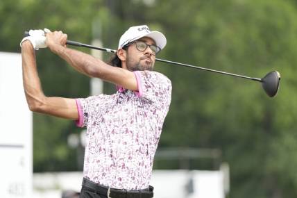 May 27, 2023; Fort Worth, Texas, USA; Akshay Bhatia plays his shot from the third tee during the third round of the Charles Schwab Challenge golf tournament. Mandatory Credit: Jim Cowsert-USA TODAY Sports