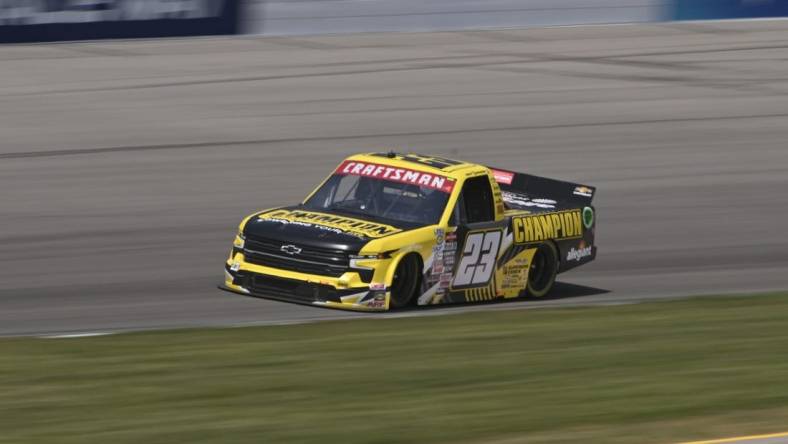 Jun 3, 2023; Madison, Illinois, USA; NASCAR Craftsman Truck Series Grant Enfinger (23) races during the Truck Series Toyota 200 at World Wide Technology Raceway. Mandatory Credit: Joe Puetz-USA TODAY Sports