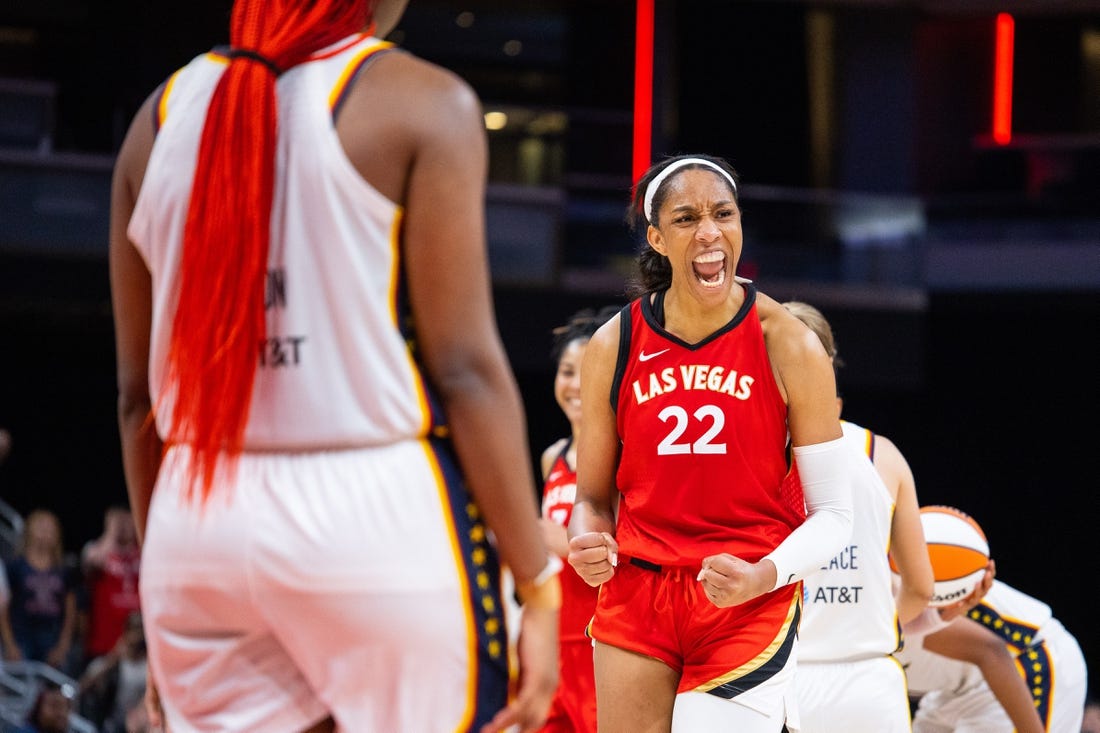 Jun 4, 2023; Indianapolis, Indiana, USA; Las Vegas Aces forward A'ja Wilson (22) celebrates the win against the Indiana Fever  at Gainbridge Fieldhouse. Mandatory Credit: Trevor Ruszkowski-USA TODAY Sports