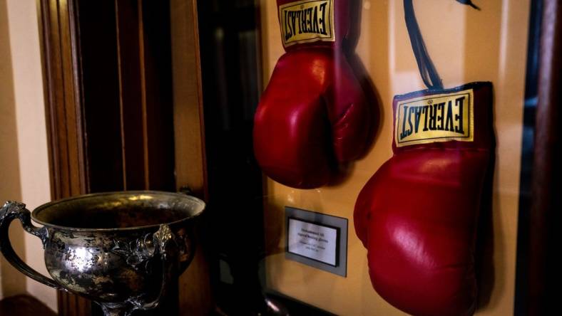 A view of signed boxing gloves by Muhammad Ali at the Dave Herche Cincinnati Athletic Club on Thursday, Jun 8, 2023 in Cincinnati.