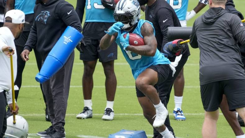 Jun 14, 2023; Charlotte, NC, USA; Carolina Panthers running back Miles Sanders (6) during a run drill during the Carolina Panthers minicamp. Mandatory Credit: Jim Dedmon-USA TODAY Sports