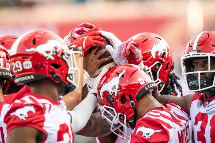 Jun 15, 2023; Ottawa, Ontario, CAN;  The Calgary Stampeders huddle prior to game against the Ottawa REDBLACKS at TD Place. Mandatory Credit: Marc DesRosiers-USA TODAY Sports