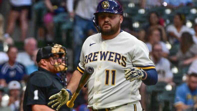 Jun 19, 2023; Milwaukee, Wisconsin, USA; Milwaukee Brewers first baseman Rowdy Tellez (11) reacts after striking out in the fifth inning against the Arizona Diamondbacks at American Family Field. Mandatory Credit: Benny Sieu-USA TODAY Sports