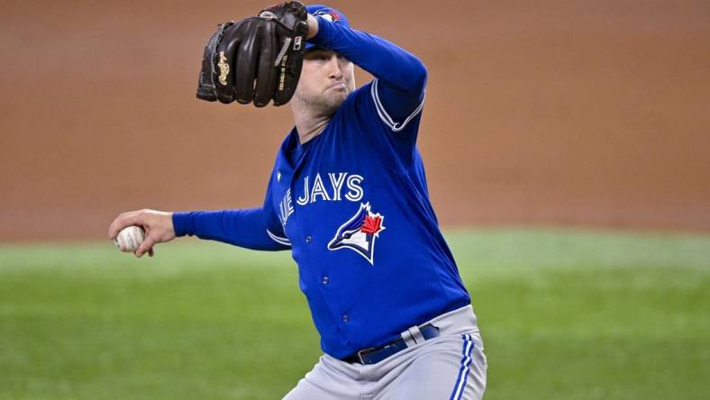 Jun 17, 2023; Arlington, Texas, USA; Toronto Blue Jays starting pitcher Trevor Richards (33) in action during the game between the Texas Rangers and the Toronto Blue Jays at Globe Life Field. Mandatory Credit: Jerome Miron-USA TODAY Sports