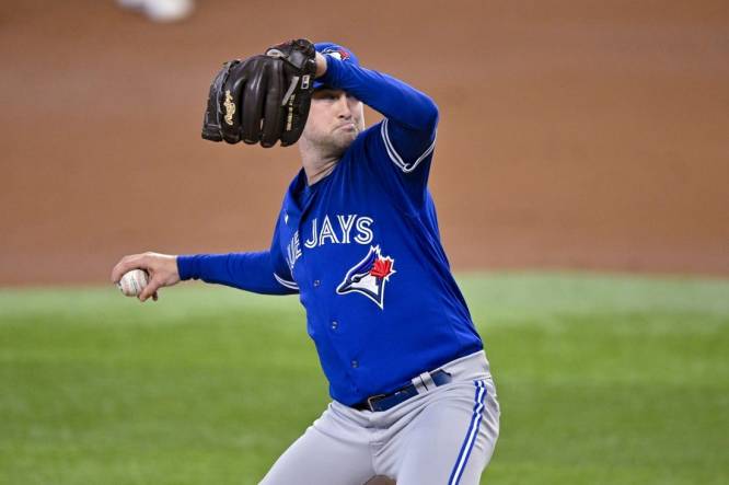 Trevor Richards of the Toronto Blue Jays pitches against the Texas