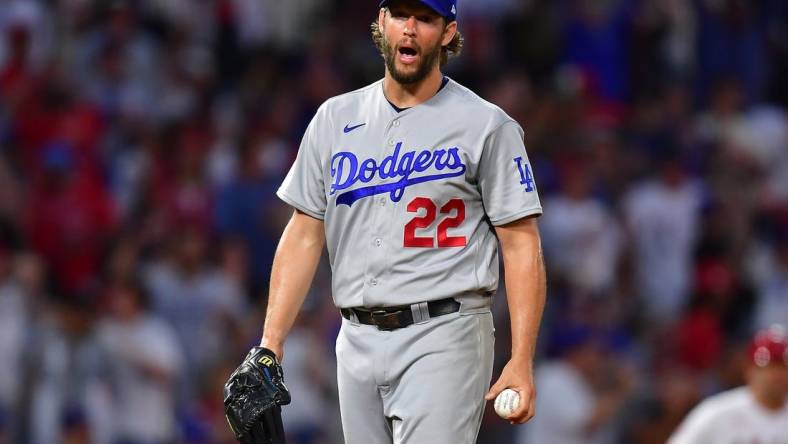 Jun 20, 2023; Anaheim, California, USA; Los Angeles Dodgers starting pitcher Clayton Kershaw (22) reacts after the home plate video review on Los Angeles Angels right fielder Hunter Renfroe (12) is overturned in the fourth inning at Angel Stadium. Mandatory Credit: Gary A. Vasquez-USA TODAY Sports