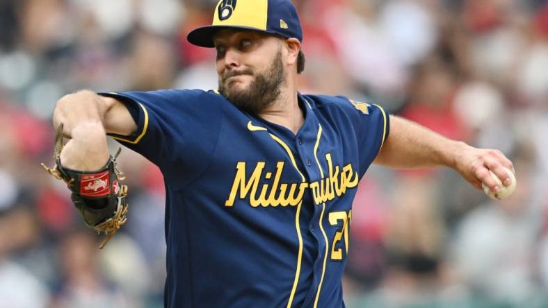 Jun 23, 2023; Cleveland, Ohio, USA; Milwaukee Brewers starting pitcher Wade Miley (20) throws a pitch during the first inning against the Cleveland Guardians at Progressive Field. Mandatory Credit: Ken Blaze-USA TODAY Sports