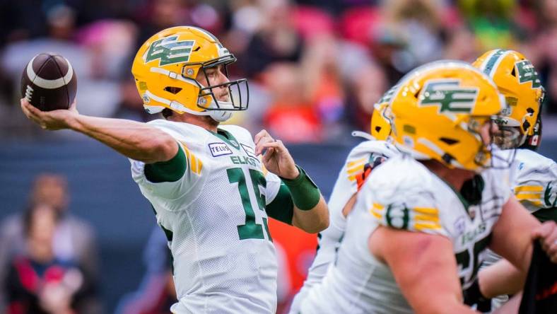 Jun 17, 2023; Vancouver, British Columbia, CAN; Edmonton Elks quarterback Taylor Cornelius (15) makes a pass against the BC Lions in the first half at BC Place. Mandatory Credit: Bob Frid-USA TODAY Sports