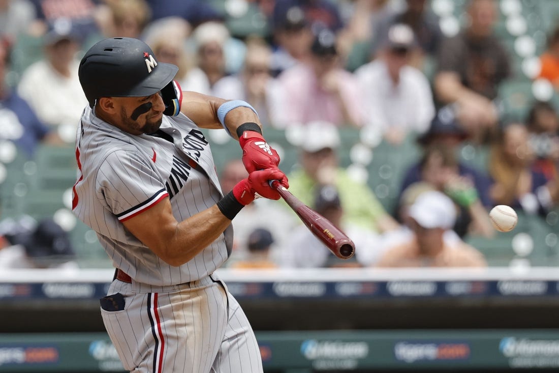 Jun 25, 2023; Detroit, Michigan, USA; Minnesota Twins third baseman Royce Lewis (23) hits a single in the sixth inning against the Detroit Tigers at Comerica Park. Mandatory Credit: Rick Osentoski-USA TODAY Sports