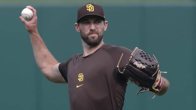 Jun 28, 2023; Pittsburgh, Pennsylvania, USA;  San Diego Padres pitcher Michael Wacha (52) throws in the outfield before the game against the Pittsburgh Pirates at PNC Park. Mandatory Credit: Charles LeClaire-USA TODAY Sports