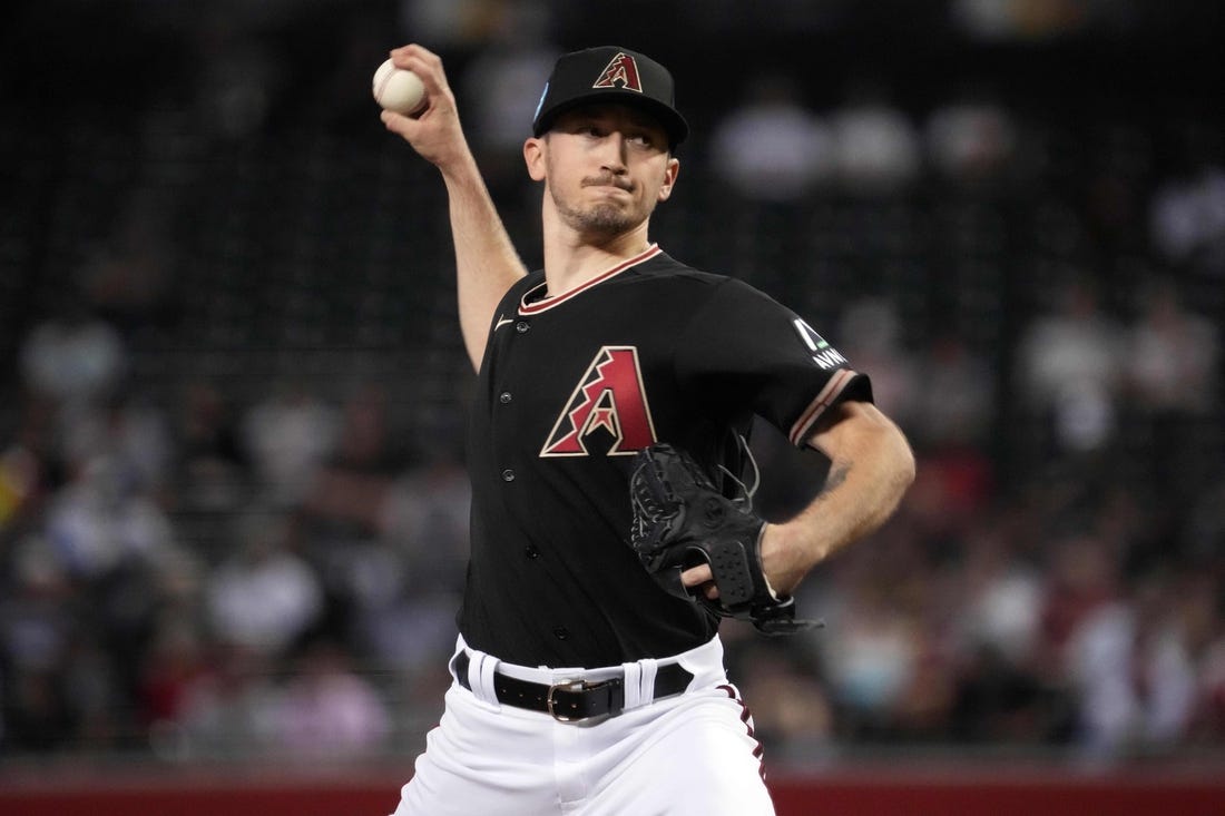 Jun 28, 2023; Phoenix, Arizona, USA; Arizona Diamondbacks starting pitcher Zach Davies (27) pitches against the Tampa Bay Rays during the third inning at Chase Field. Mandatory Credit: Joe Camporeale-USA TODAY Sports