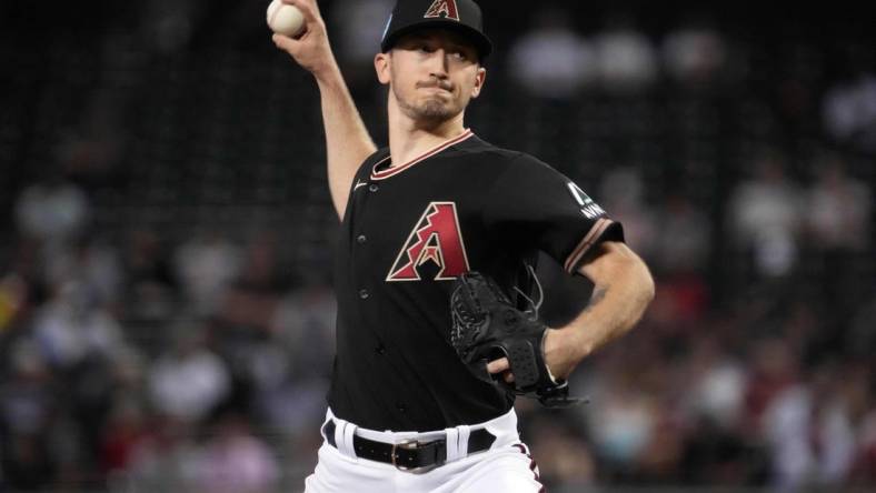 Jun 28, 2023; Phoenix, Arizona, USA; Arizona Diamondbacks starting pitcher Zach Davies (27) pitches against the Tampa Bay Rays during the third inning at Chase Field. Mandatory Credit: Joe Camporeale-USA TODAY Sports