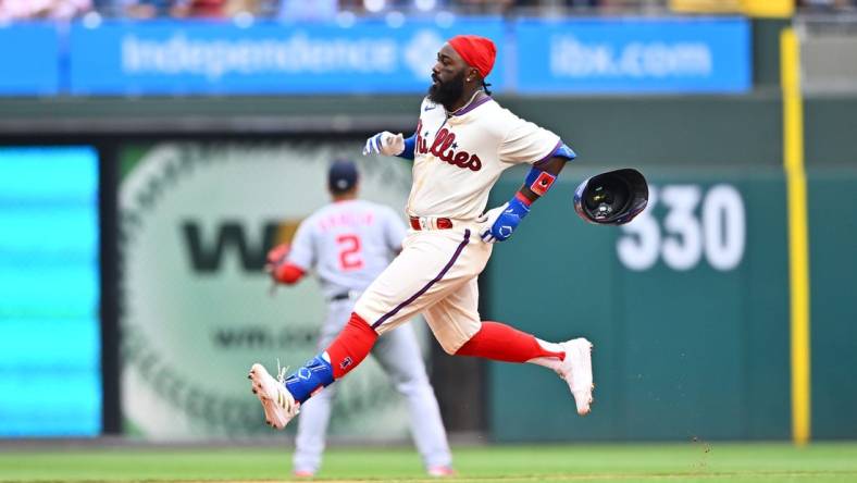 Jul 1, 2023; Philadelphia, Pennsylvania, USA; Philadelphia Phillies outfielder Josh Harrison (2) advances to second after hitting a double against the Washington Nationals in the fourth inning at Citizens Bank Park. Mandatory Credit: Kyle Ross-USA TODAY Sports