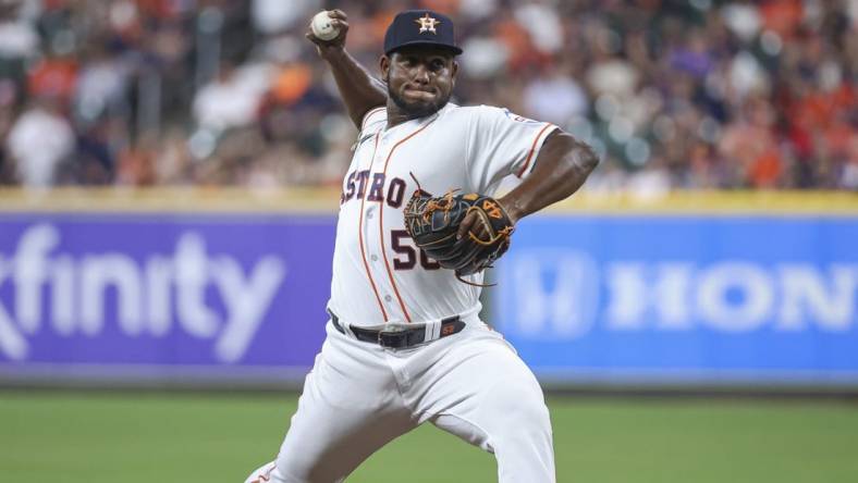 Jul 6, 2023; Houston, Texas, USA; Houston Astros starting pitcher Ronel Blanco (56) delivers a pitch during the third inning against the Seattle Mariners at Minute Maid Park. Mandatory Credit: Troy Taormina-USA TODAY Sports