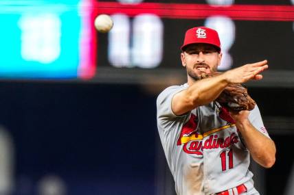 Jul 6, 2023; Miami, Florida, USA; St. Louis Cardinals shortstop Paul DeJong (11) throws the ball to first base against the Miami Marlins during the eighth inning at loanDepot Park. Mandatory Credit: Rich Storry-USA TODAY Sports
