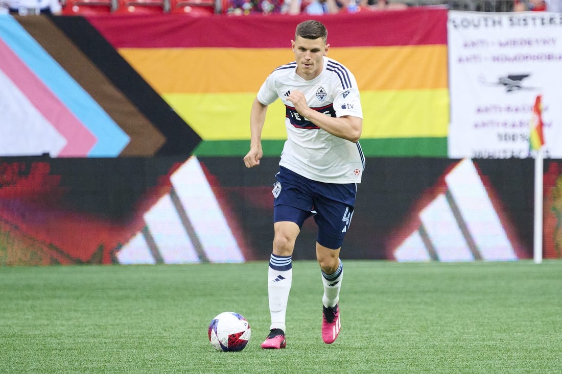 Jul 8, 2023; Vancouver, British Columbia, CAN; Vancouver Whitecaps defender Ranko Veselinovic (4) controls a pass during the first half against the Seattle Sounders at BC Place. Mandatory Credit: Troy Wayrynen-USA TODAY Sports