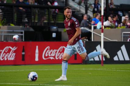 Jul 12, 2023; Commerce City, Colorado, USA; Colorado Rapids midfielder Bryan Acosta (21) in action during the second half against the Portland Timbers at Dick's Sporting Goods Park. Mandatory Credit: Ron Chenoy-USA TODAY Sports