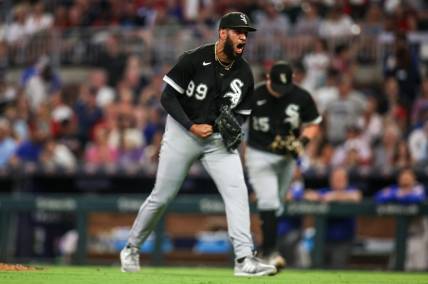 Jul 15, 2023; Atlanta, Georgia, USA; Chicago White Sox relief pitcher Keynan Middleton (99) reacts after an out against the Atlanta Braves in the eighth inning at Truist Park. Mandatory Credit: Brett Davis-USA TODAY Sports