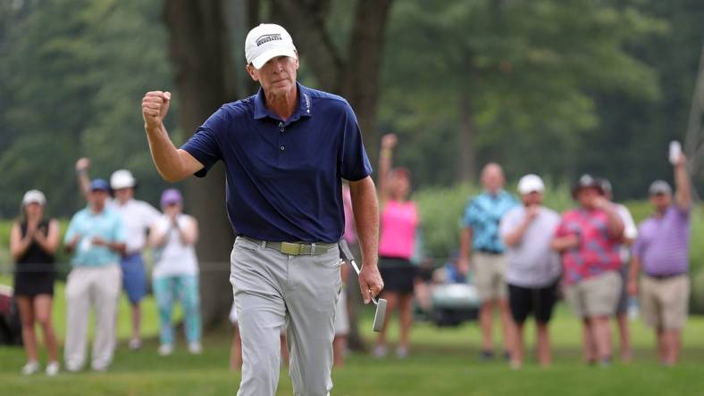 Steve Stricker pumps his fist after his birdie putt on the No. 15 green during the final round of the 2023 Kaulig Companies Championship at Firestone Country Club, Sunday, July 16, 2023, in Akron, Ohio.