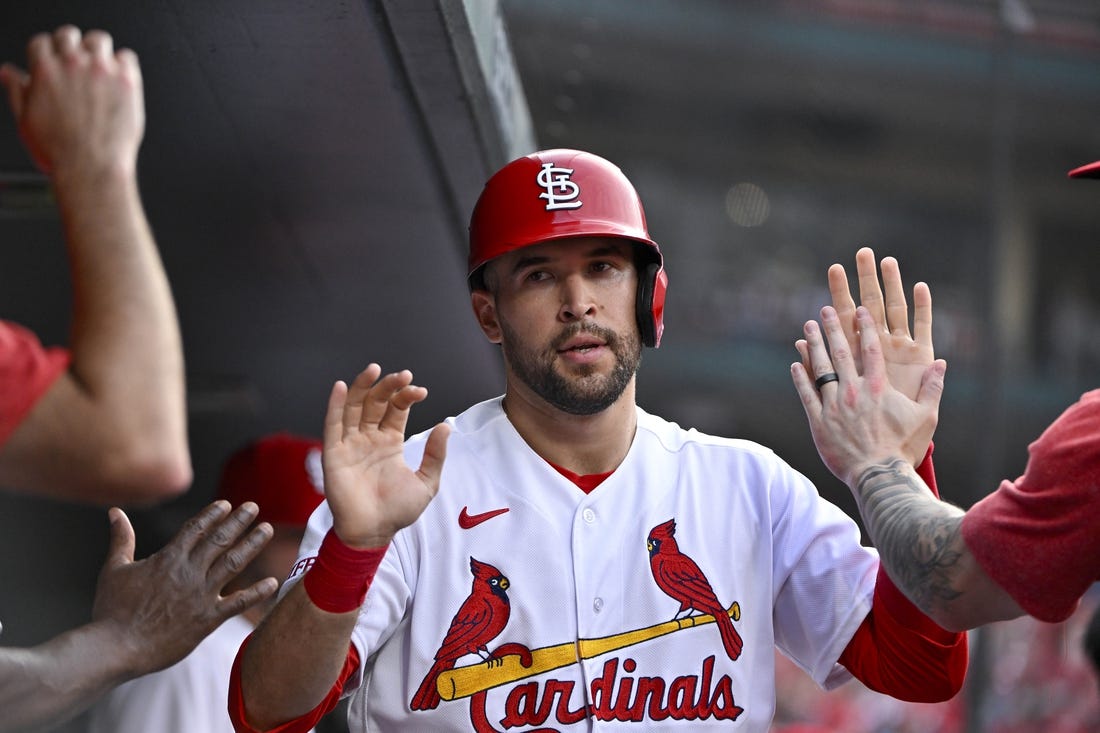 Jul 17, 2023; St. Louis, Missouri, USA;  St. Louis Cardinals center fielder Dylan Carlson (3) is congaratulated by teammates after scoring against the Miami Marlins during the third inning at Busch Stadium. Mandatory Credit: Jeff Curry-USA TODAY Sports