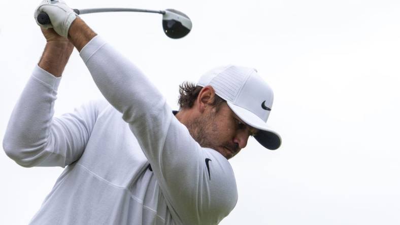 July 18, 2023; Hoylake, ENGLAND, GBR; Brooks Koepka hits his tee shot on the fifth hole during a practice round of The Open Championship golf tournament at Royal Liverpool. Mandatory Credit: Kyle Terada-USA TODAY Sports