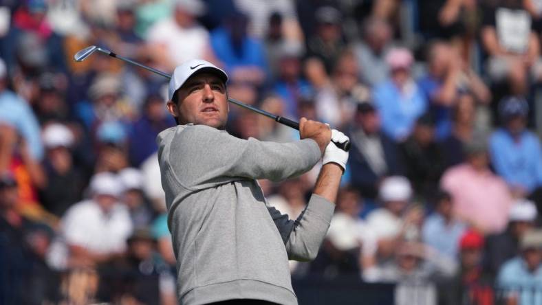 July 20, 2023; Hoylake, ENGLAND, GBR; Scottie Scheffler plays his shot from the fourth tee during the first round of The Open Championship golf tournament at Royal Liverpool. Mandatory Credit: Kyle Terada-USA TODAY Sports