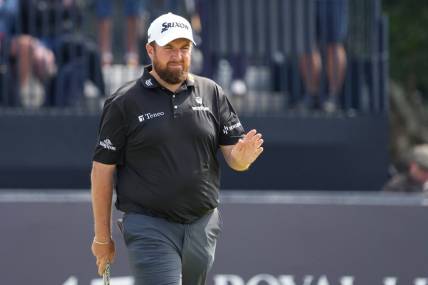 July 20, 2023; Hoylake, ENGLAND, GBR; Shane Lowry acknowledges the crowd on the seventh green during the first round of The Open Championship golf tournament at Royal Liverpool. Mandatory Credit: Kyle Terada-USA TODAY Sports