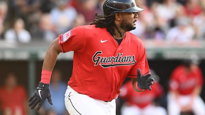 Jul 21, 2023; Cleveland, Ohio, USA; Cleveland Guardians designated hitter Josh Bell (55) hits an RBI double during the first inning against the Philadelphia Phillies at Progressive Field. Mandatory Credit: Ken Blaze-USA TODAY Sports