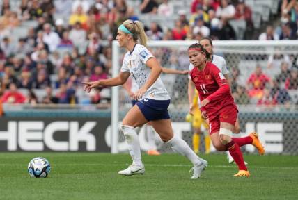 Jul 22, 2023; Auckland, NZL;  USA midfielder Julie Ertz (8) controls the ball against Vietnam midfielder Thai Thi Thao (11) in the first half of a group stage match in the 2023 FIFA Women's World Cup at Eden Park. Mandatory Credit: Jenna Watson-USA TODAY Sports