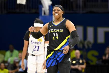 Jul 22, 2023; Arlington, Texas, USA; Dallas Wings guard Arike Ogunbowale (24) celebrates during the second half against the Los Angeles Sparks at College Park Center. Mandatory Credit: Jerome Miron-USA TODAY Sports