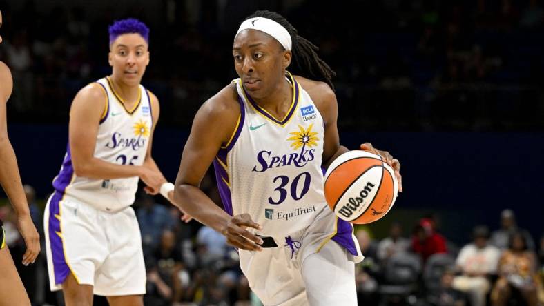 Jul 22, 2023; Arlington, Texas, USA; Los Angeles Sparks forward Nneka Ogwumike (30) brings the ball up court against the Dallas Wings during the second half at College Park Center. Mandatory Credit: Jerome Miron-USA TODAY Sports