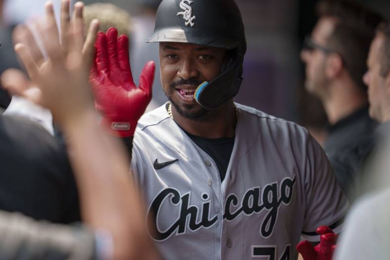 Jul 23, 2023; Minneapolis, Minnesota, USA; Chicago White Sox designated hitter Eloy Jimenez (74) celebrates in the dugout after hitting a home run off Minnesota Twins starting pitcher Bailey Ober (17) in the second inning at Target Field. Mandatory Credit: Matt Blewett-USA TODAY Sports