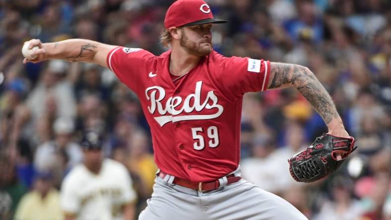 Jul 26, 2023; Milwaukee, Wisconsin, USA; Cincinnati Reds starting pitcher Ben Lively (59) pitches against the Milwaukee Brewers in the first inning at American Family Field. Mandatory Credit: Benny Sieu-USA TODAY Sports