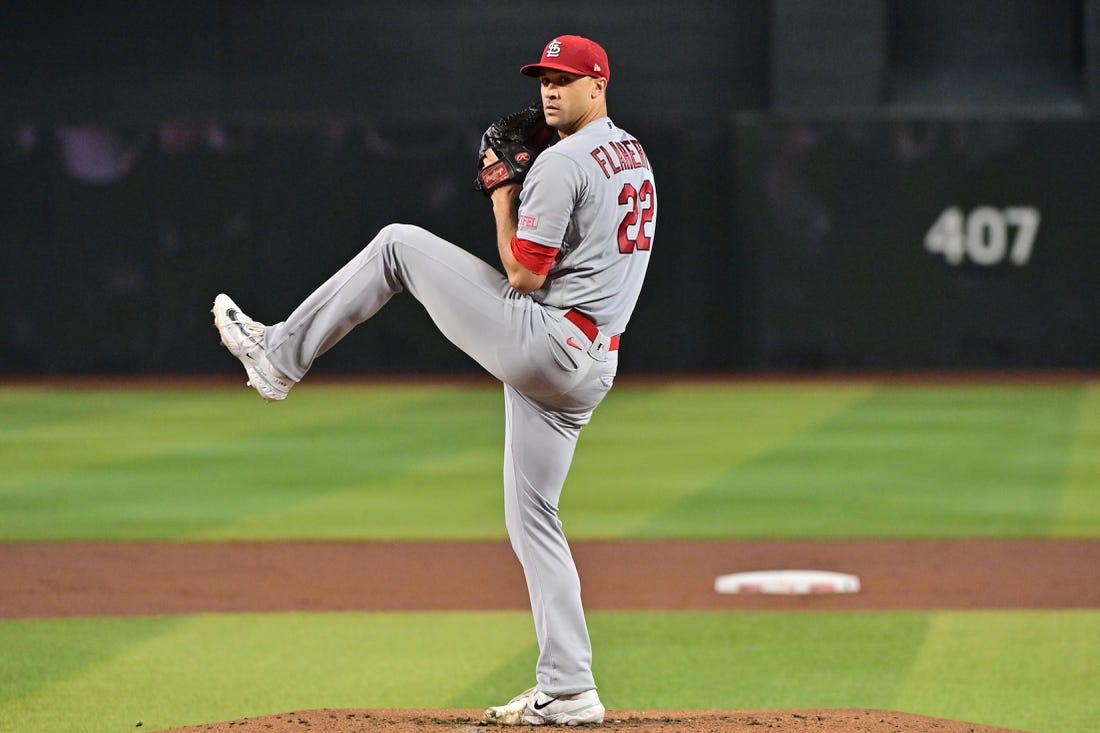 Jul 26, 2023; Phoenix, Arizona, USA;  St. Louis Cardinals starting pitcher Jack Flaherty (22) throws in the first inning against the Arizona Diamondbacks at Chase Field. Mandatory Credit: Matt Kartozian-USA TODAY Sports