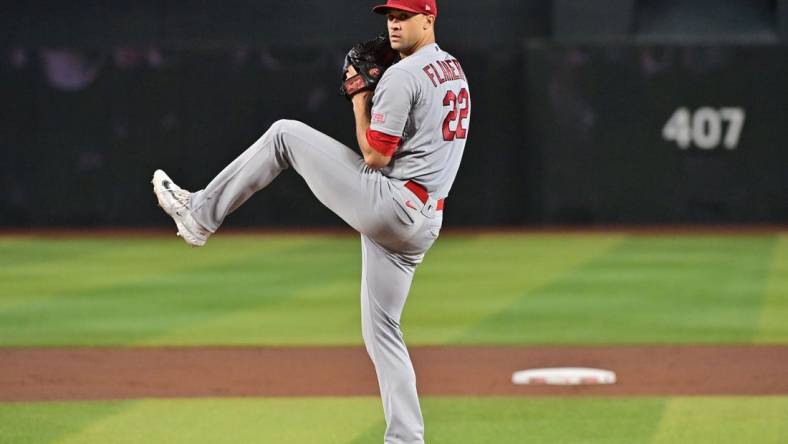 Jul 26, 2023; Phoenix, Arizona, USA;  St. Louis Cardinals starting pitcher Jack Flaherty (22) throws in the first inning against the Arizona Diamondbacks at Chase Field. Mandatory Credit: Matt Kartozian-USA TODAY Sports