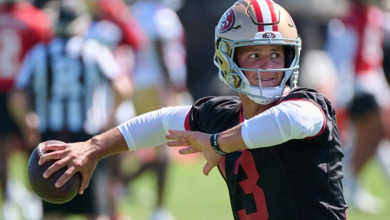 Jul 27, 2023; Santa Clara, CA, USA; San Francisco 49ers quarterback Brock Purdy (13) throws a pass during training camp at the SAP Performance Facility. Mandatory Credit: Robert Edwards-USA TODAY Sports